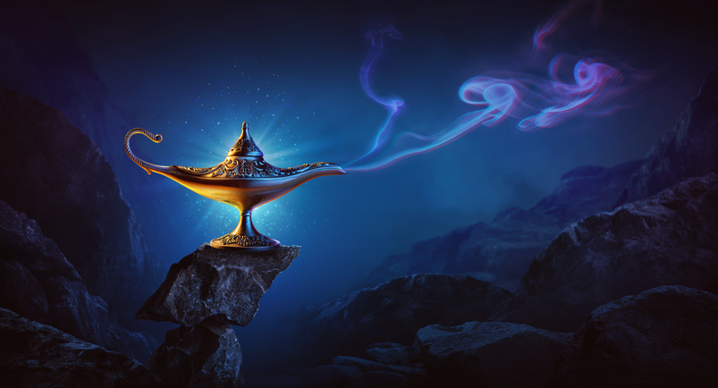 Golden magic lamp on bright and purple background