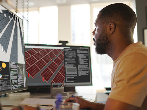 man working on a task at his desk