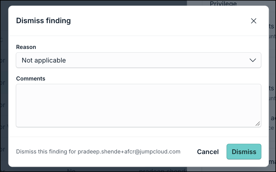 The image displays the Dismiss finding dialog with Reason and Comments fields