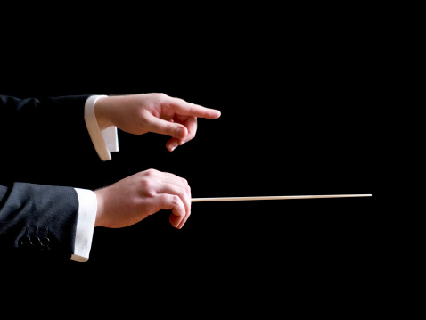 Music conductor pointing