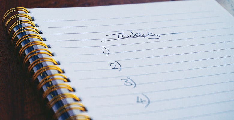 An image of a notebook that says "Today" with a numbered list.